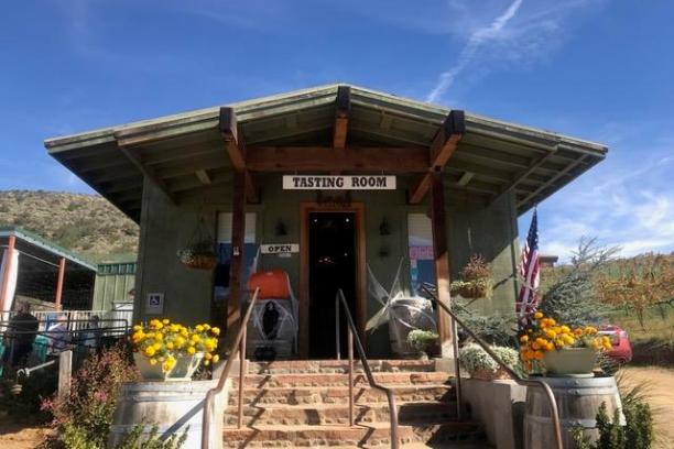 a group of people standing in front of a building